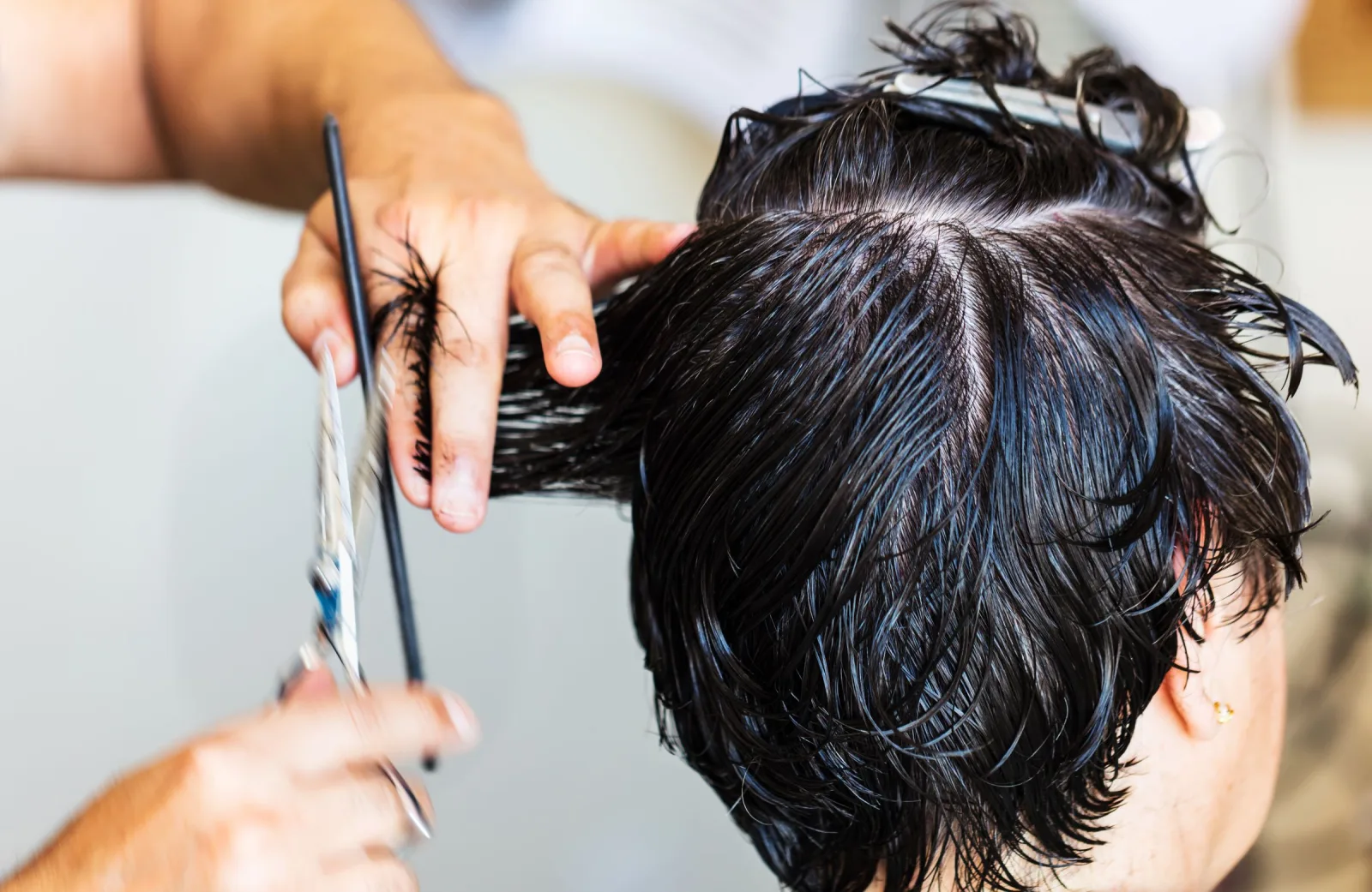 An Acme Salon stylist at work